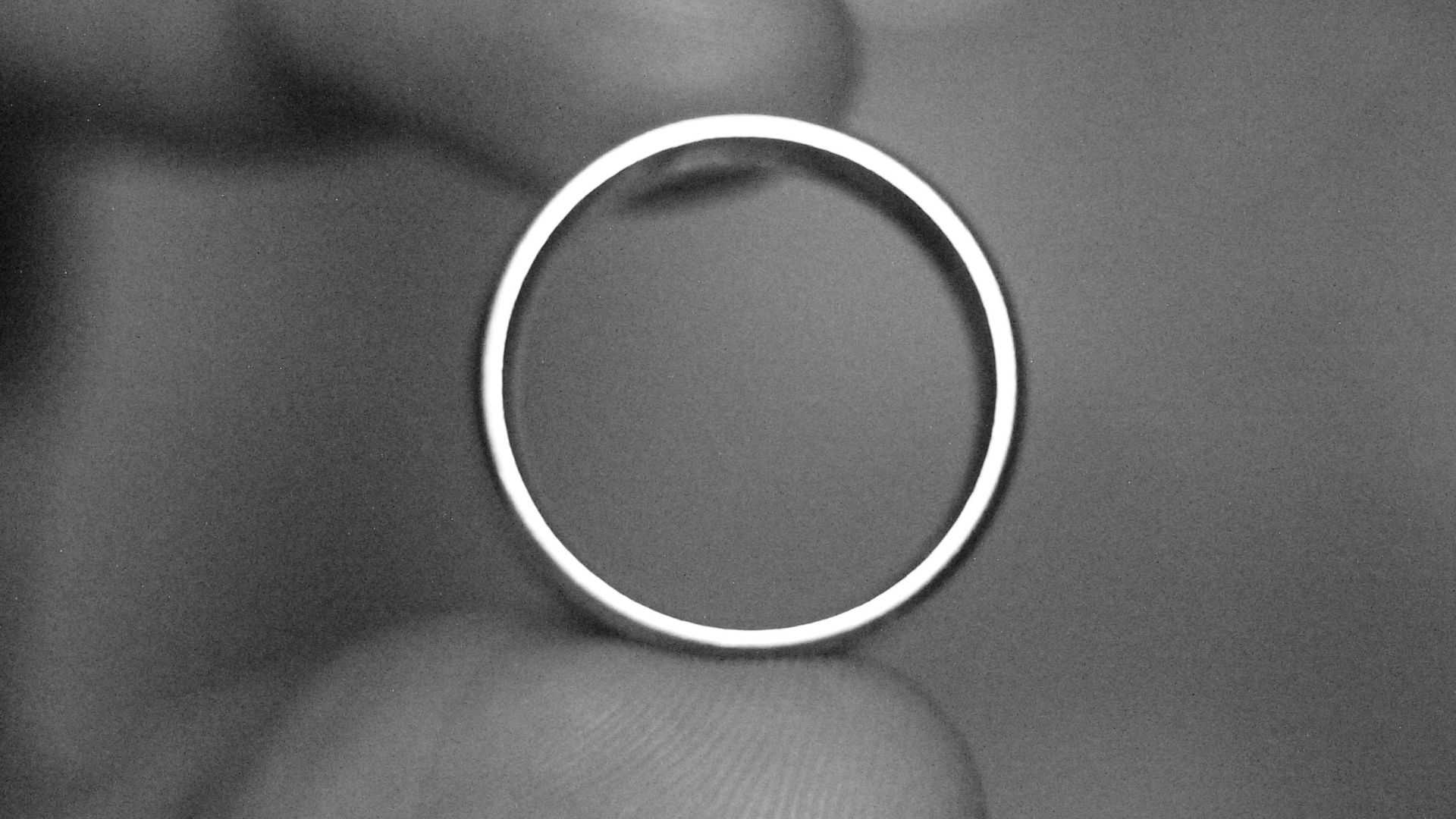 grayscale photography of ring