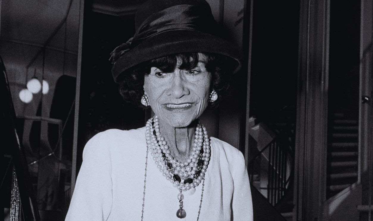 Gettyimages - 1470745055, French Fashion Designer Coco Chanel French Fashion Designer Coco Chanel at home. 