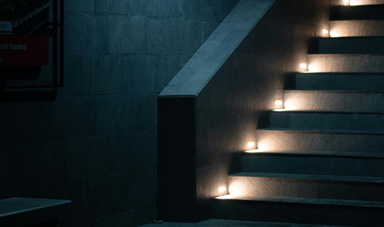 Hidden Lighting Beneath Stairs