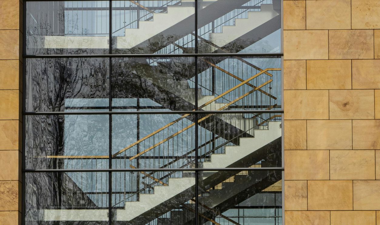 Staircase Embedded In A Glass Cube Facade