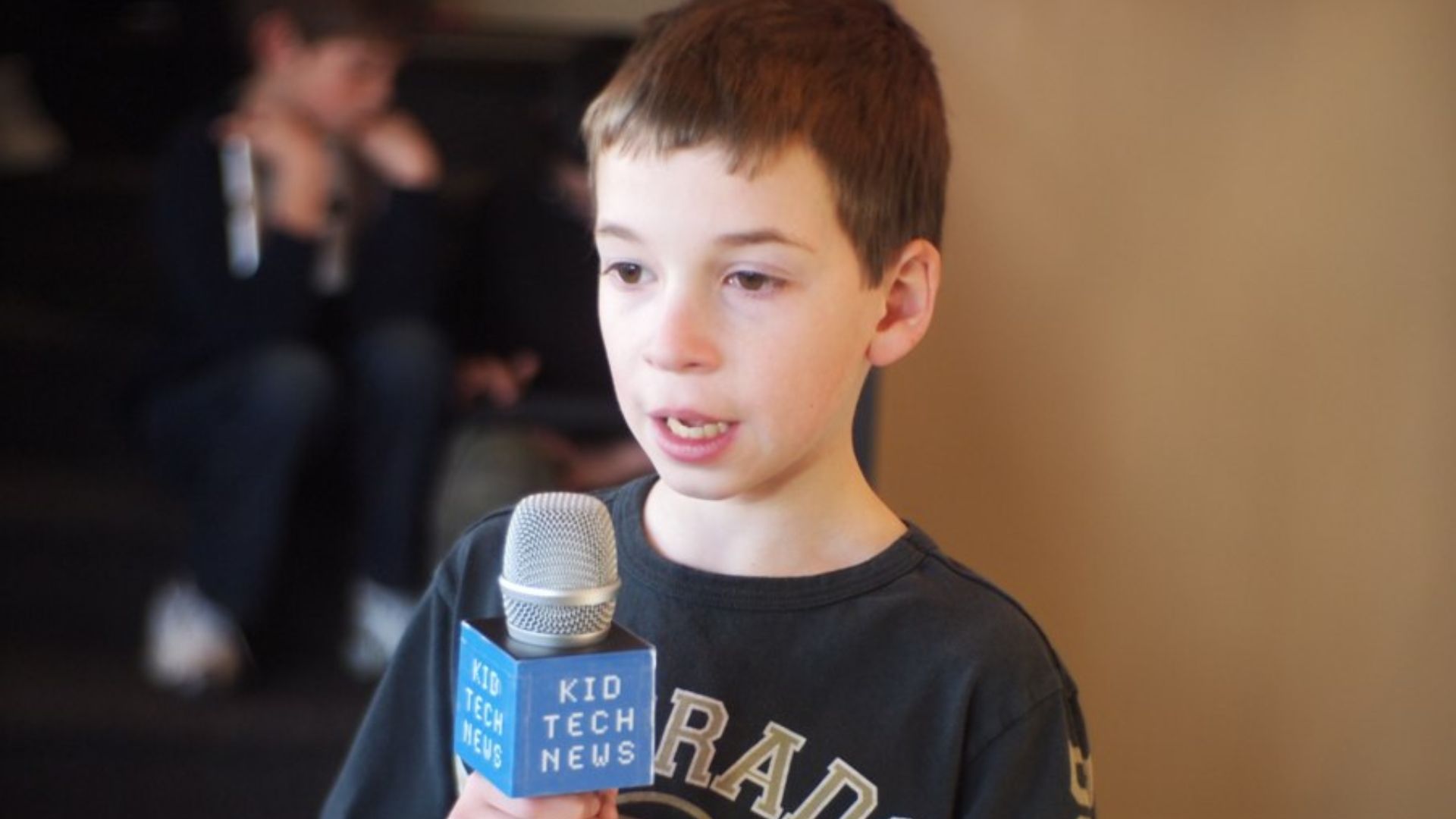 File:Schoolboy with microphone.jpg