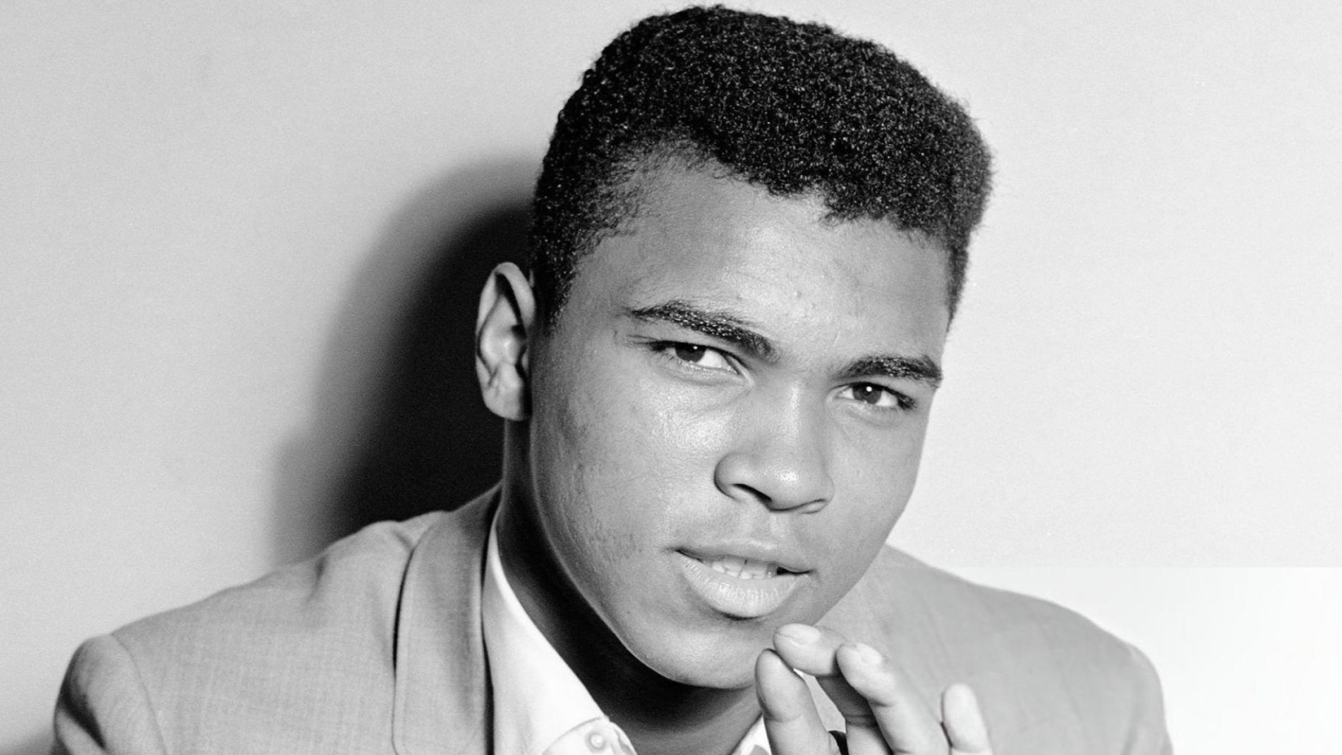 File:Muhammad Ali portrait with shirt in Muhammad Ali The Legend Lives On.webp