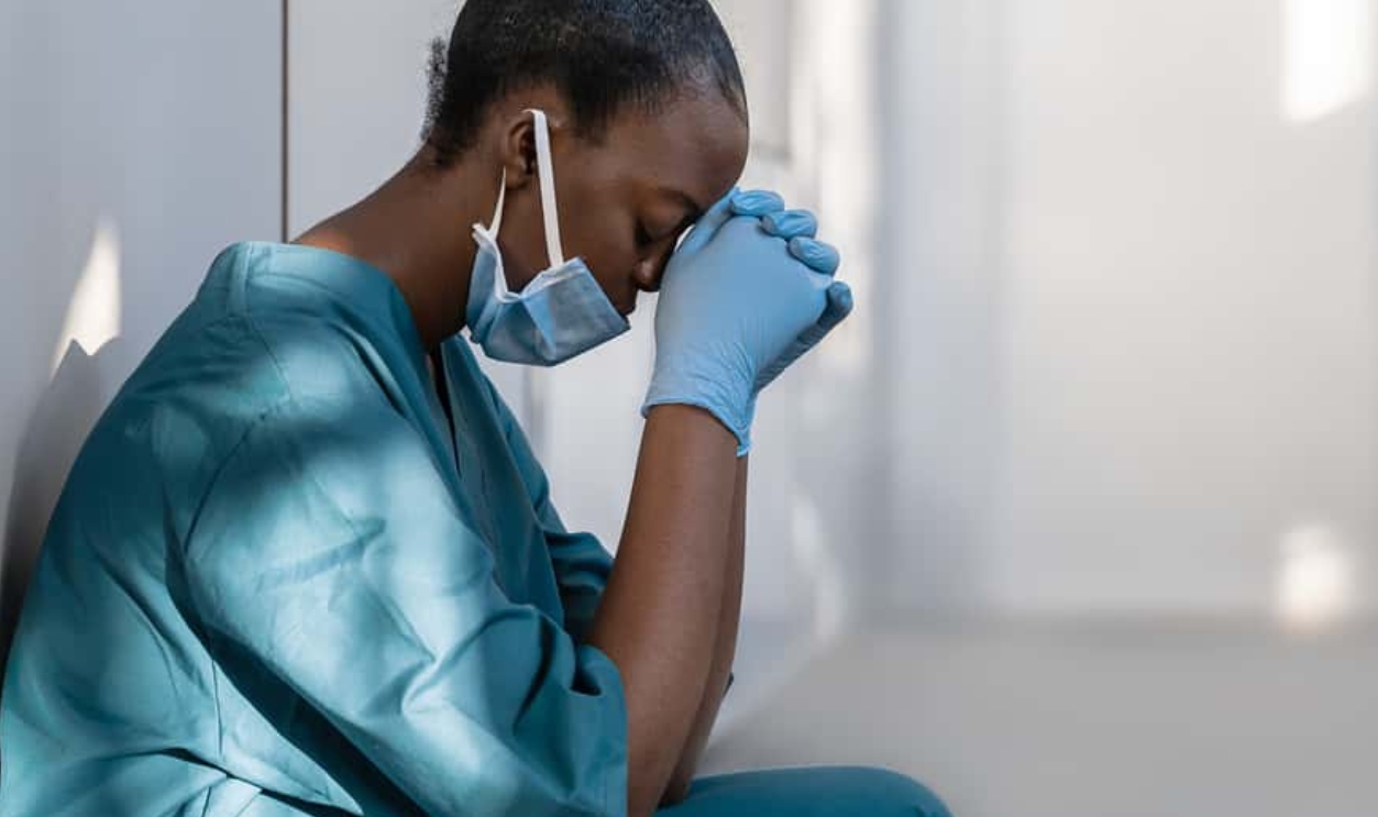 Tired Depressed Female African Scrub Nurse, Shutterstock, 1761627959