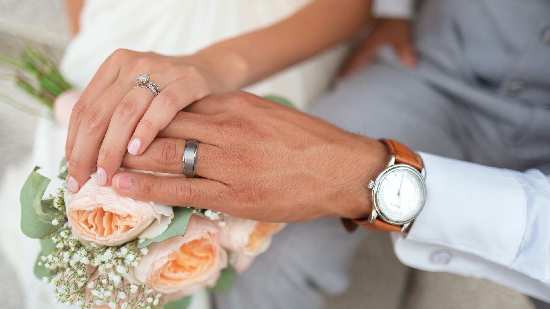 man and woman holding hands
