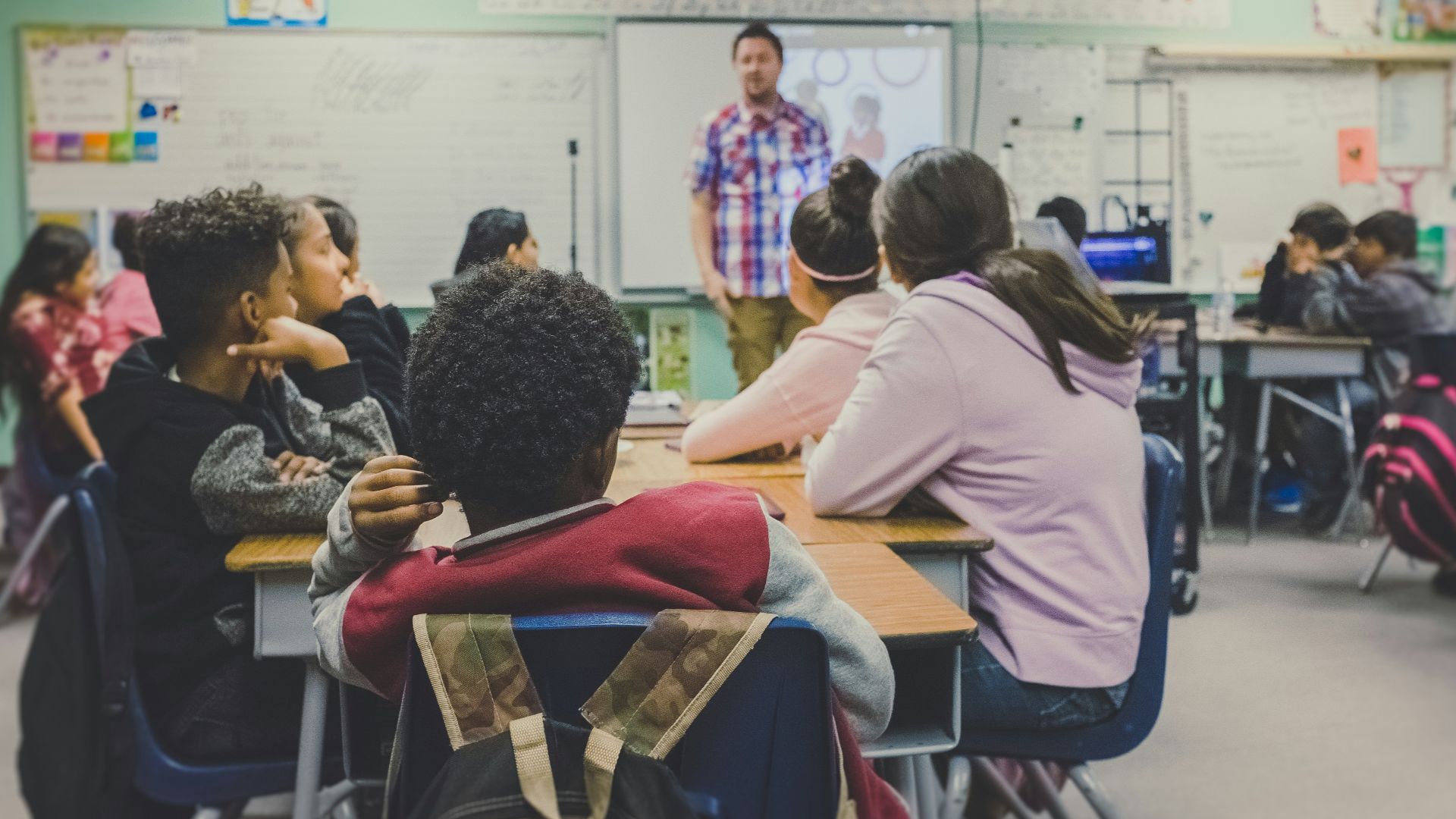 man and woman sitting on chairs