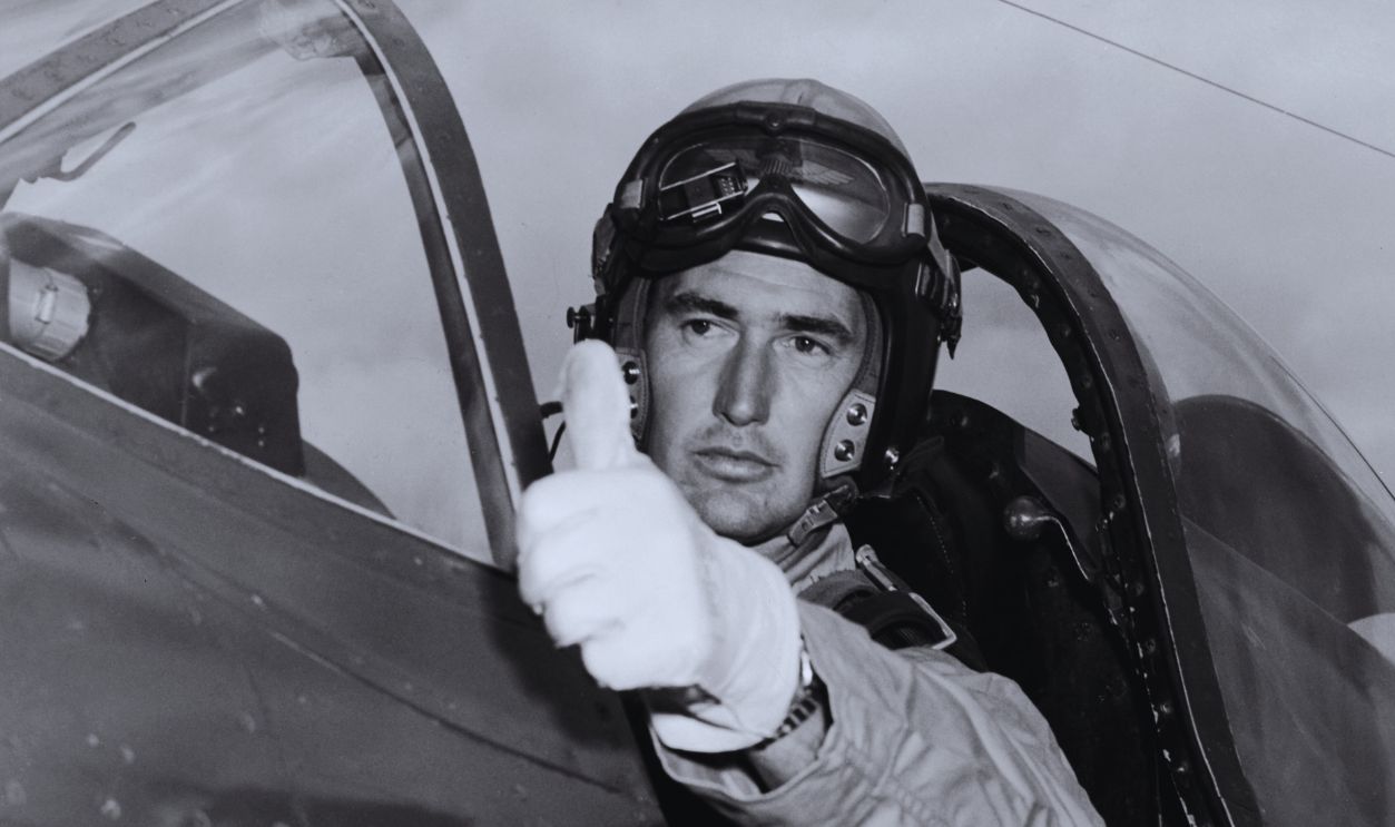 Gettyimages - 51684739, This file photo shows baseball Hall of Famer and f FLUSHING, : This file photo shows baseball Hall of Famer and former Boston Red Sox player Ted Williams, with his son John Henry Williams (R) at his side, throwing out the first pitch during pre-game ceremonies at