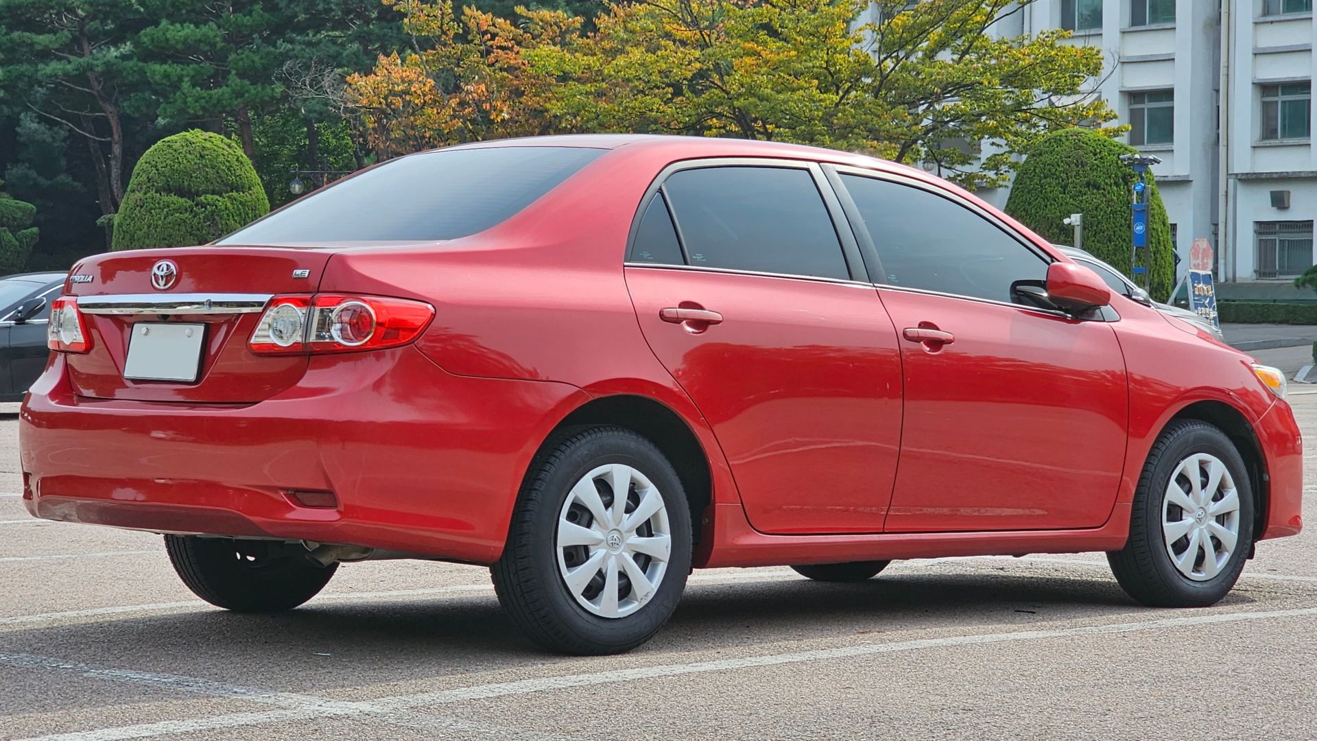 File:Toyota Corolla LE E150 Red Mica Metallic (16).jpg