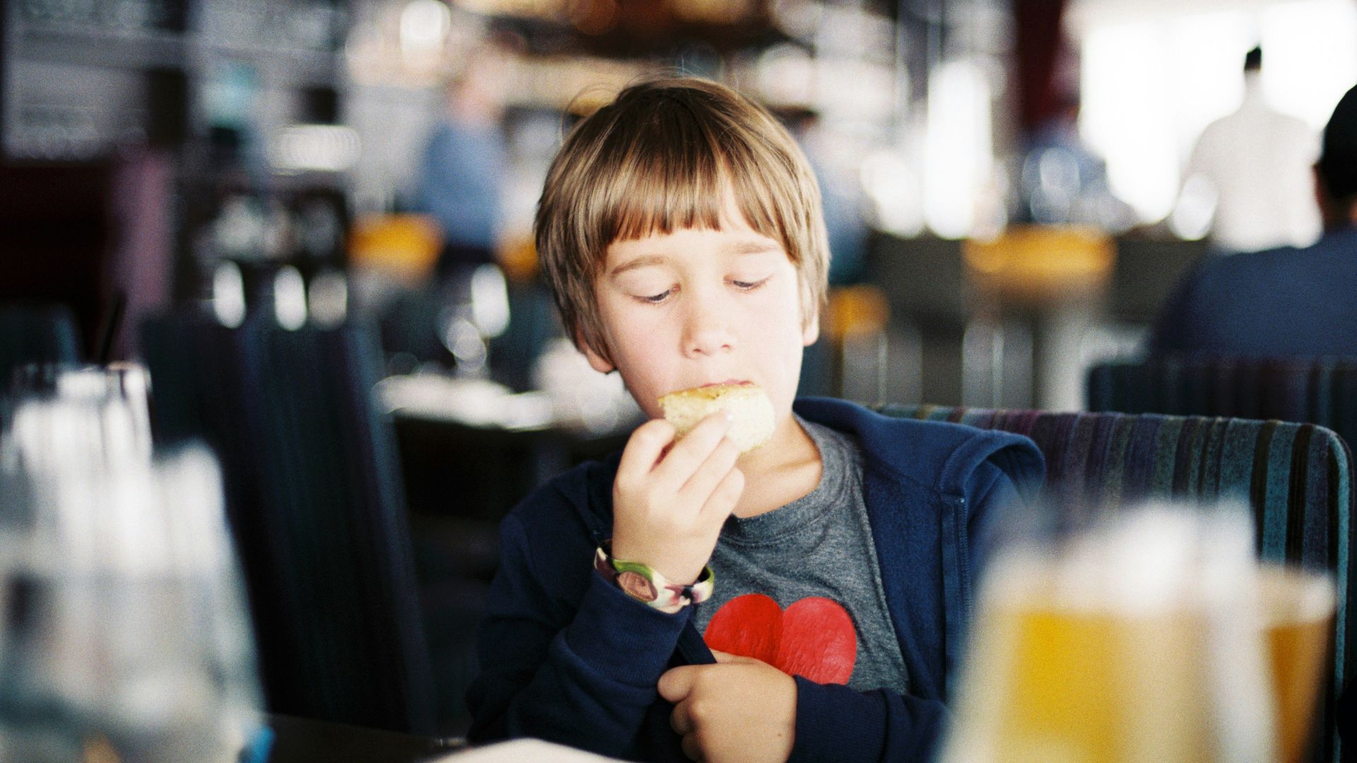 boy wearing blue jacket