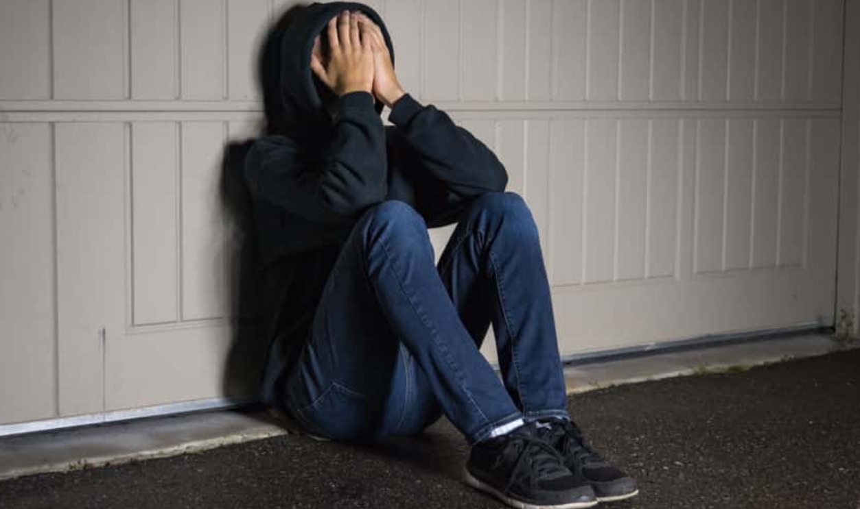 Depressed Male Teenager, Shutterstock, 768950656