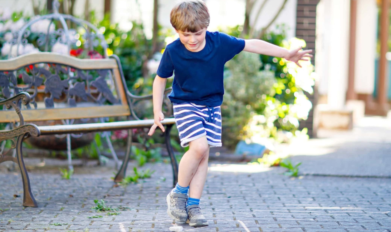 Little Blond Funny Kid Boy Playing Hopscotch, Shutterstock, 1011647605