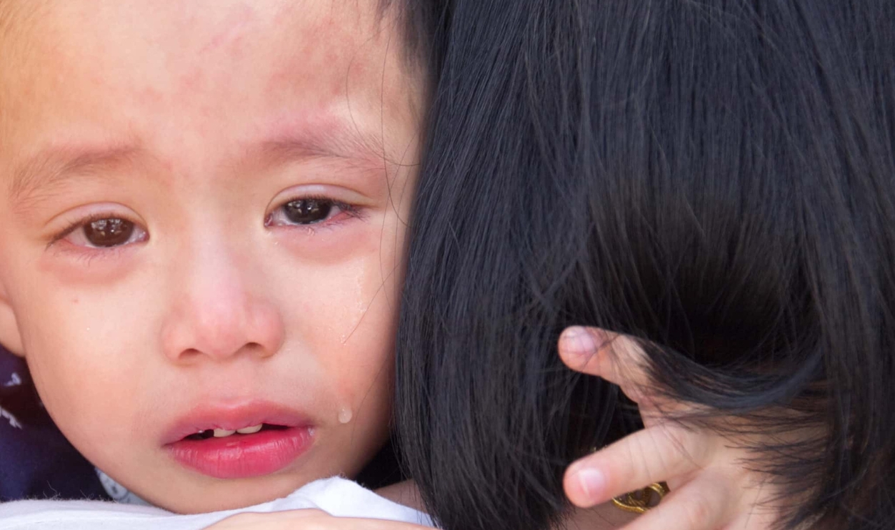 Sad Little Asian Boy Is Crying, Shutterstock, 1121155325