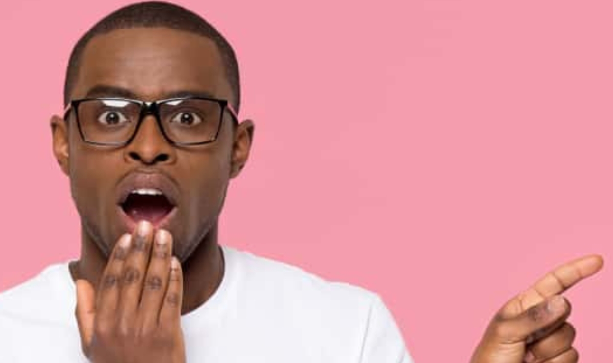 Shocked Black Man With Open Mouth, Shutterstock, 1296335608
