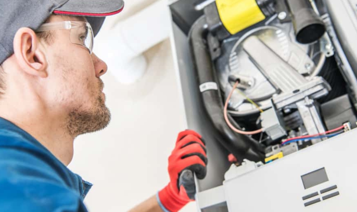 Technician And The Heater Issue, Shutterstock, 1391109278