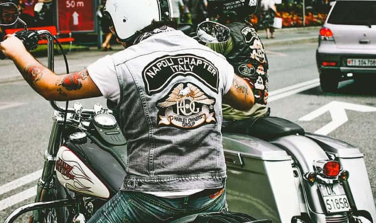 Woman Is Whispering A Secret Into Her Friends Ear, Shutterstock, 662471446