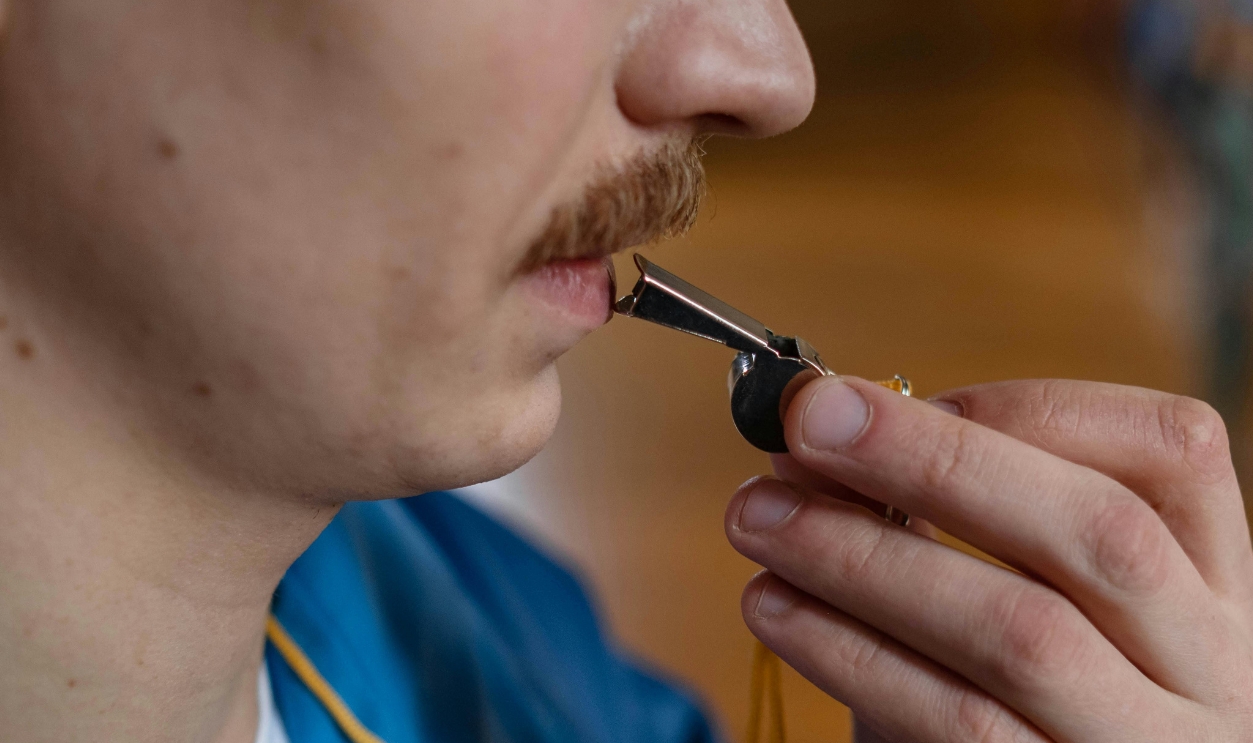 Person Ready To Blow A Whistle