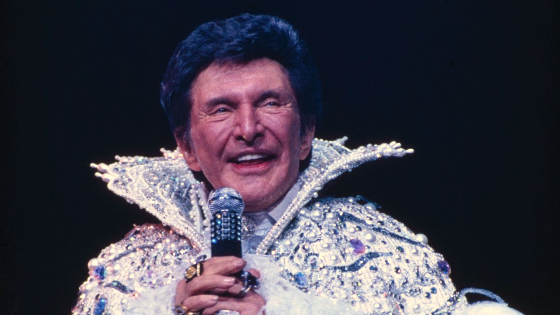 File:Liberace at Rockefeller Center, 50th, NYC.jpg