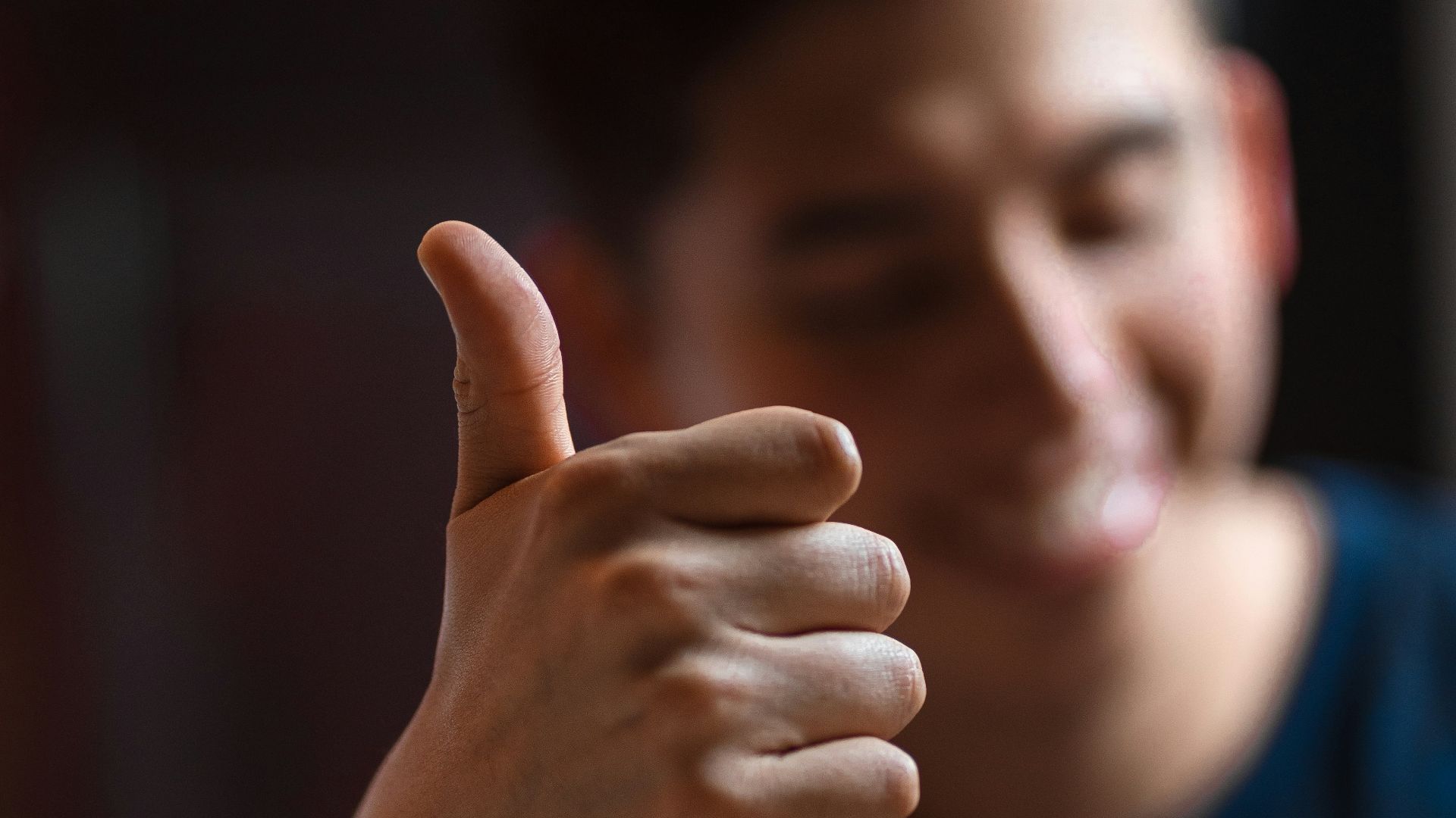 man wearing blue crew-neck shirt