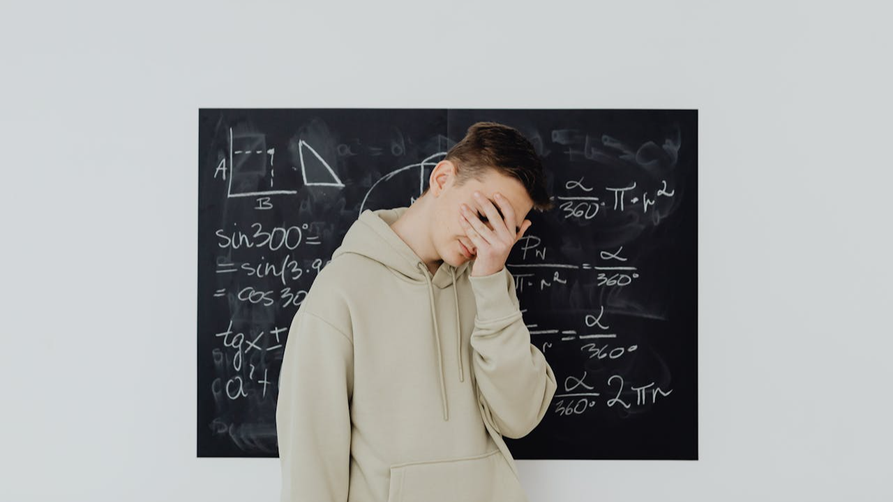 Embarrassed Boy Covering His Face.