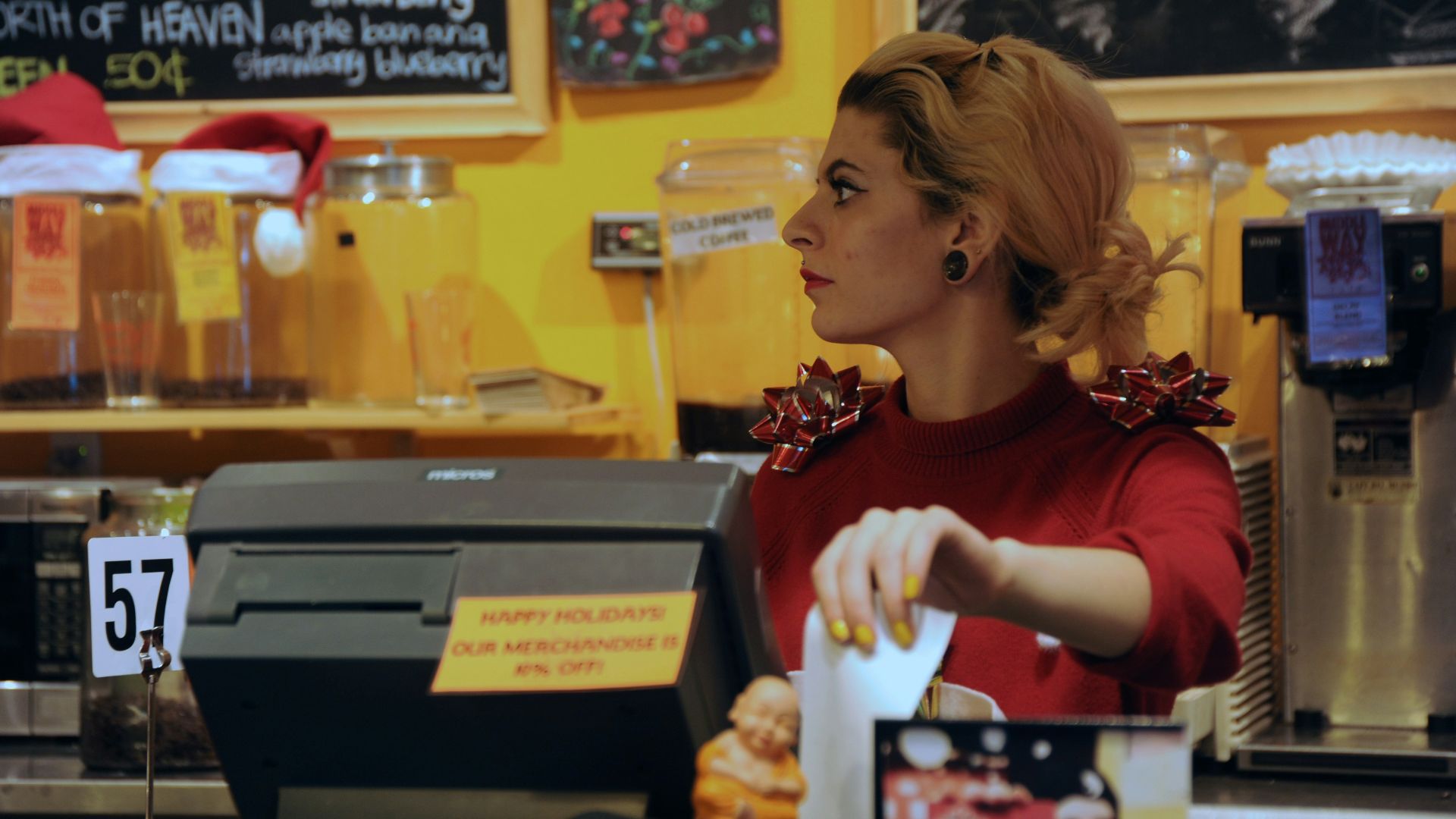 shallow focus photo of woman in red long-sleeved shirt