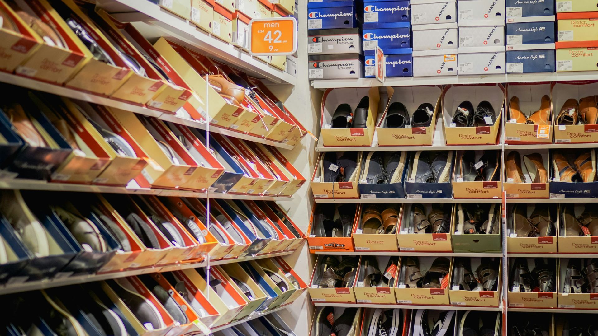 assorted pairs of shoes on boxes