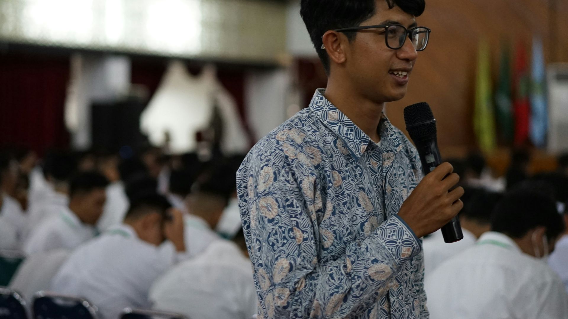 a person holding a microphone