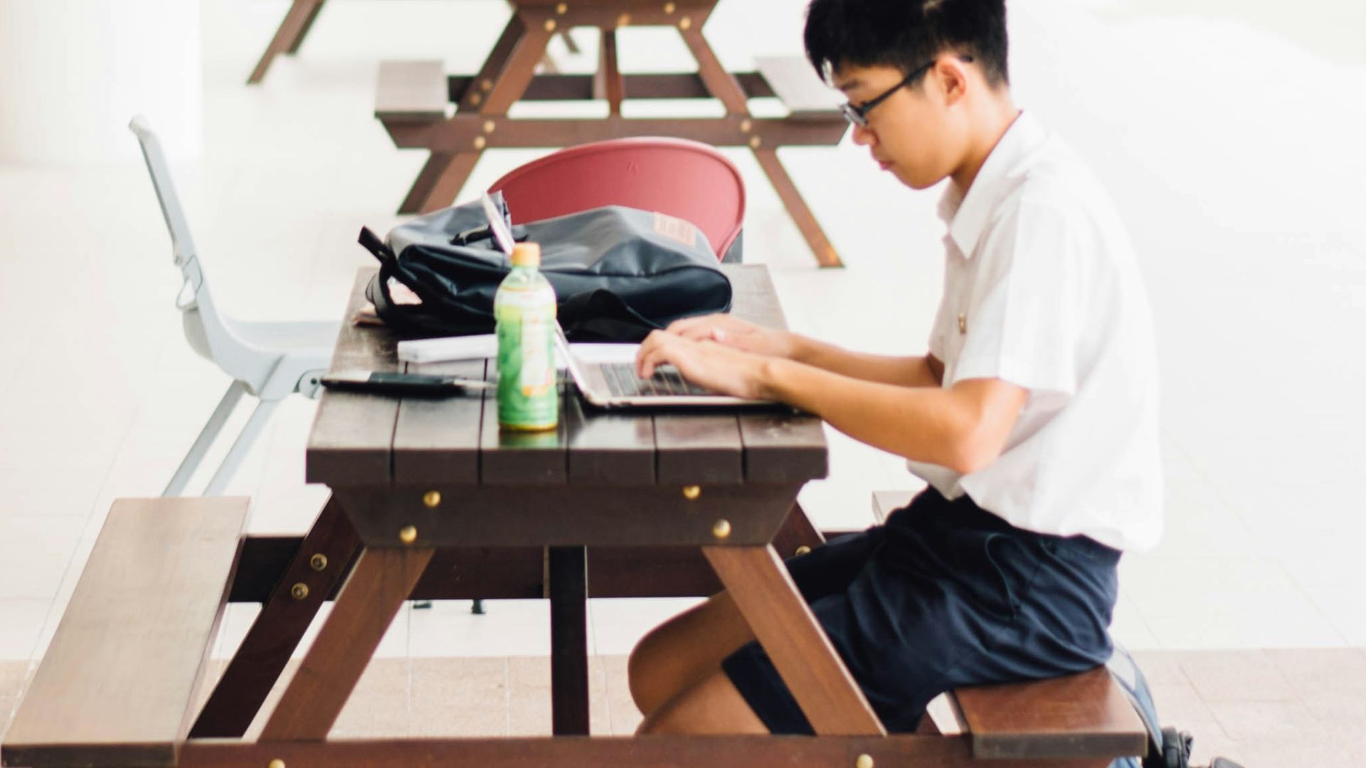 boy sitting on chair