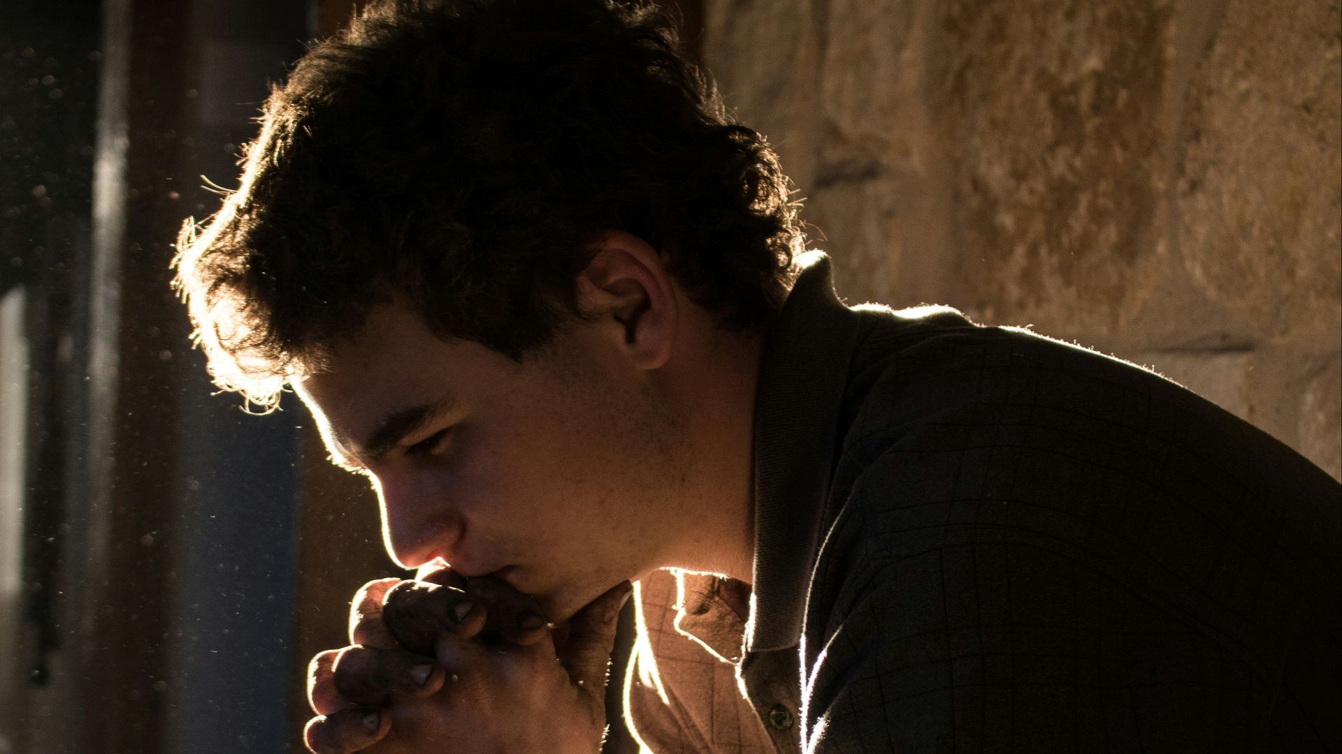 man sitting on bench