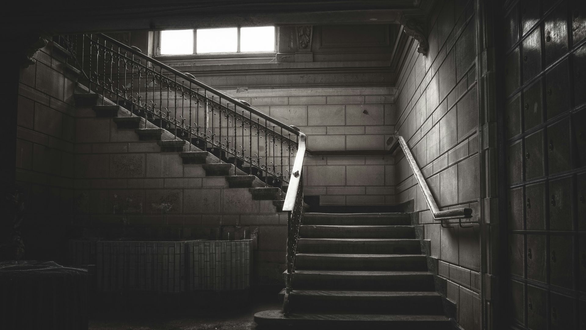 a set of stairs leading up to a window