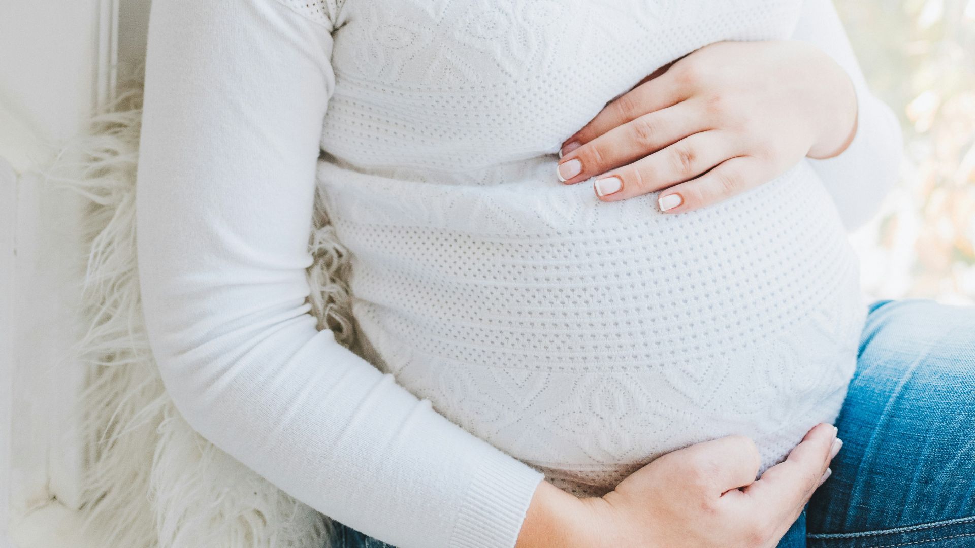 woman in white long sleeve shirt