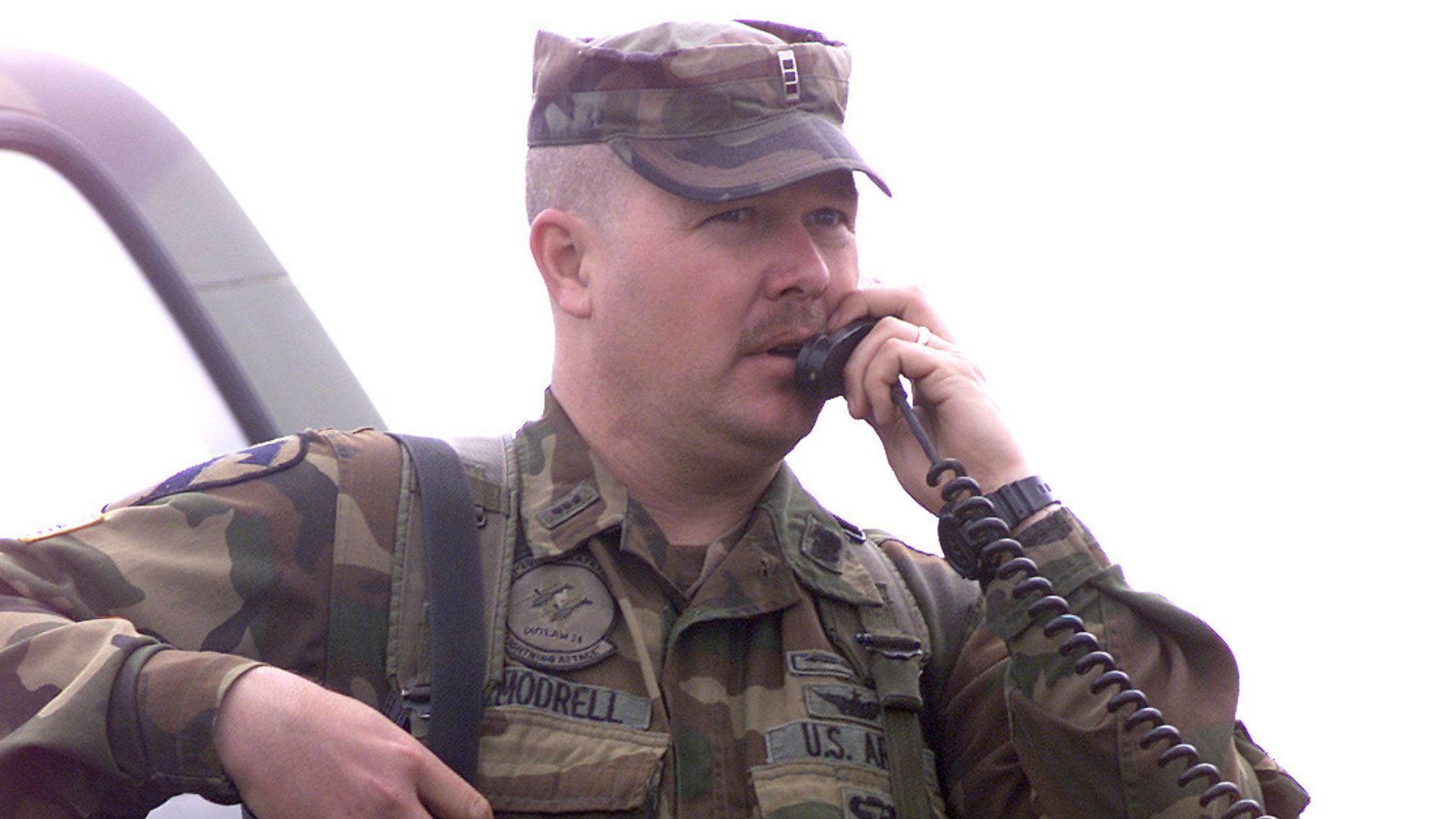 File:020602-F-EF201-010 Lance Modrell uses a Tactical Satellite phone to provide direction to a pair of OH-58D Kiowa Warrior.jpeg