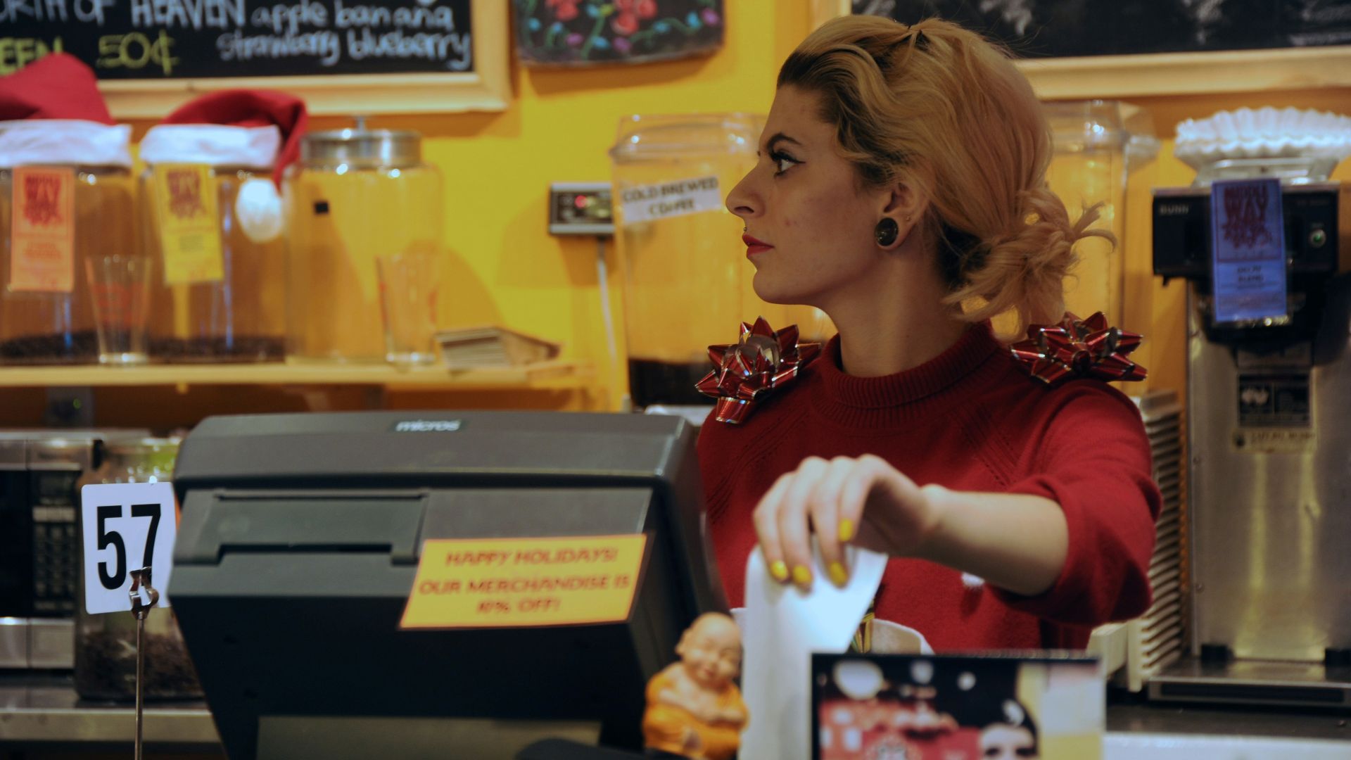 shallow focus photo of woman in red long-sleeved shirt