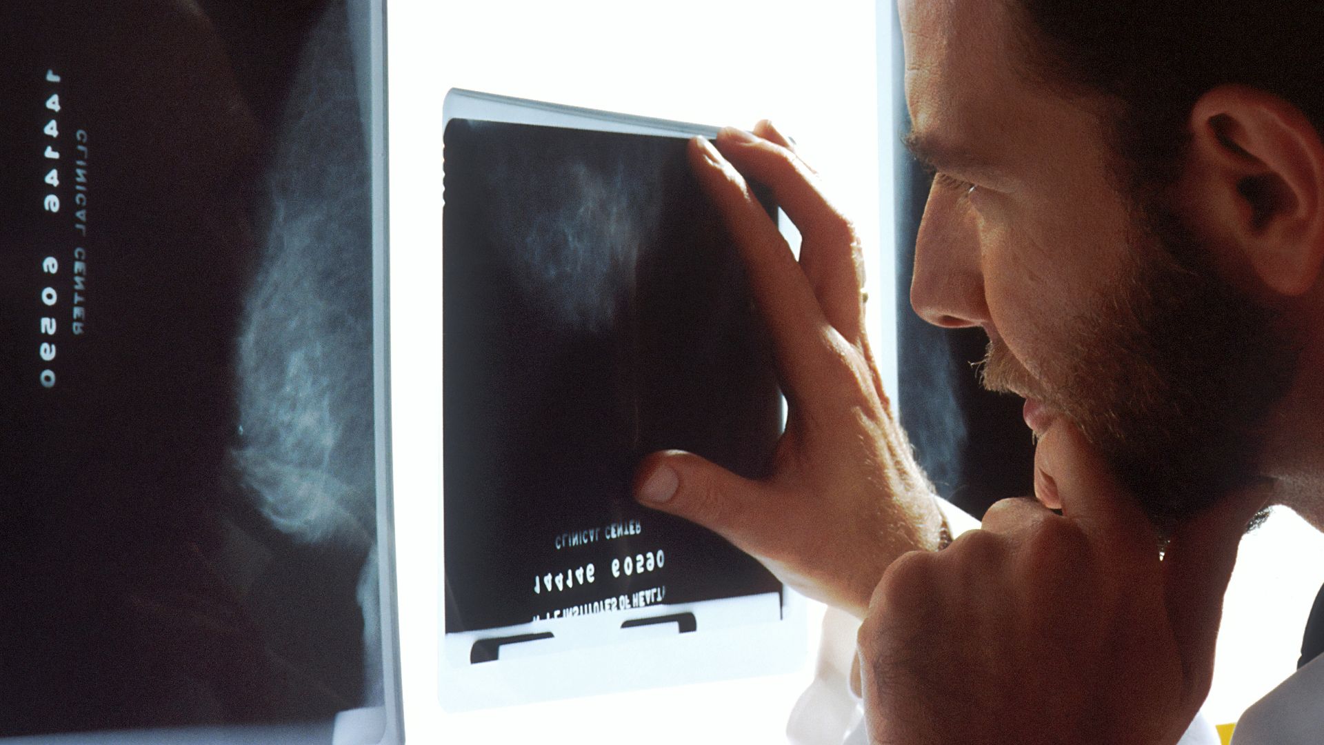 person holding black tablet computer