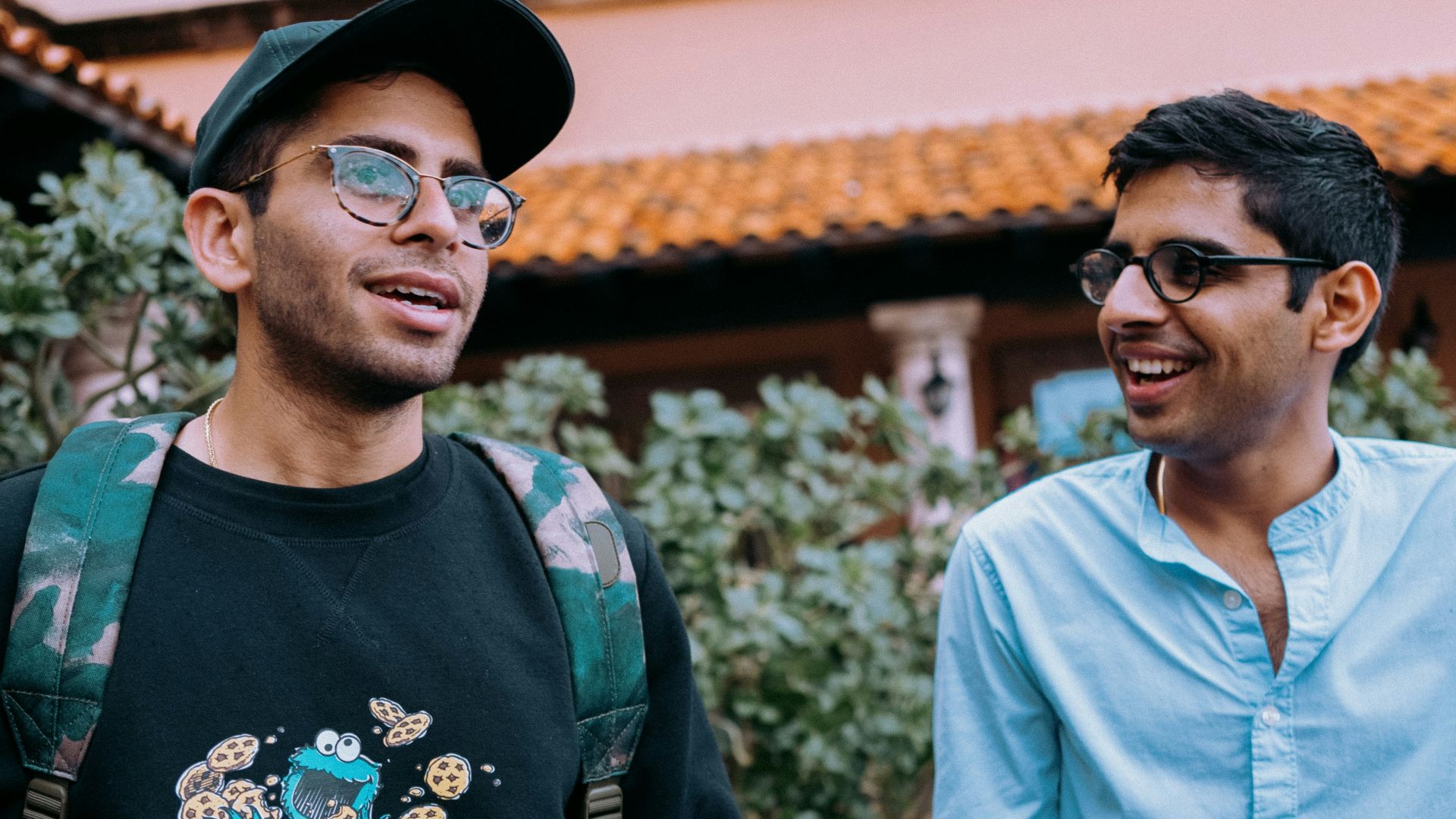 man in blue crew neck shirt beside man in blue crew neck shirt