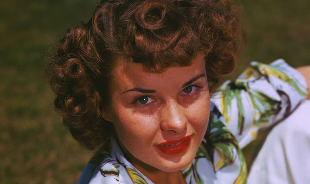 Gettyimages - 2221177817, Jean Peters Jean Peters color portrait in floral shirt circa 1946. 