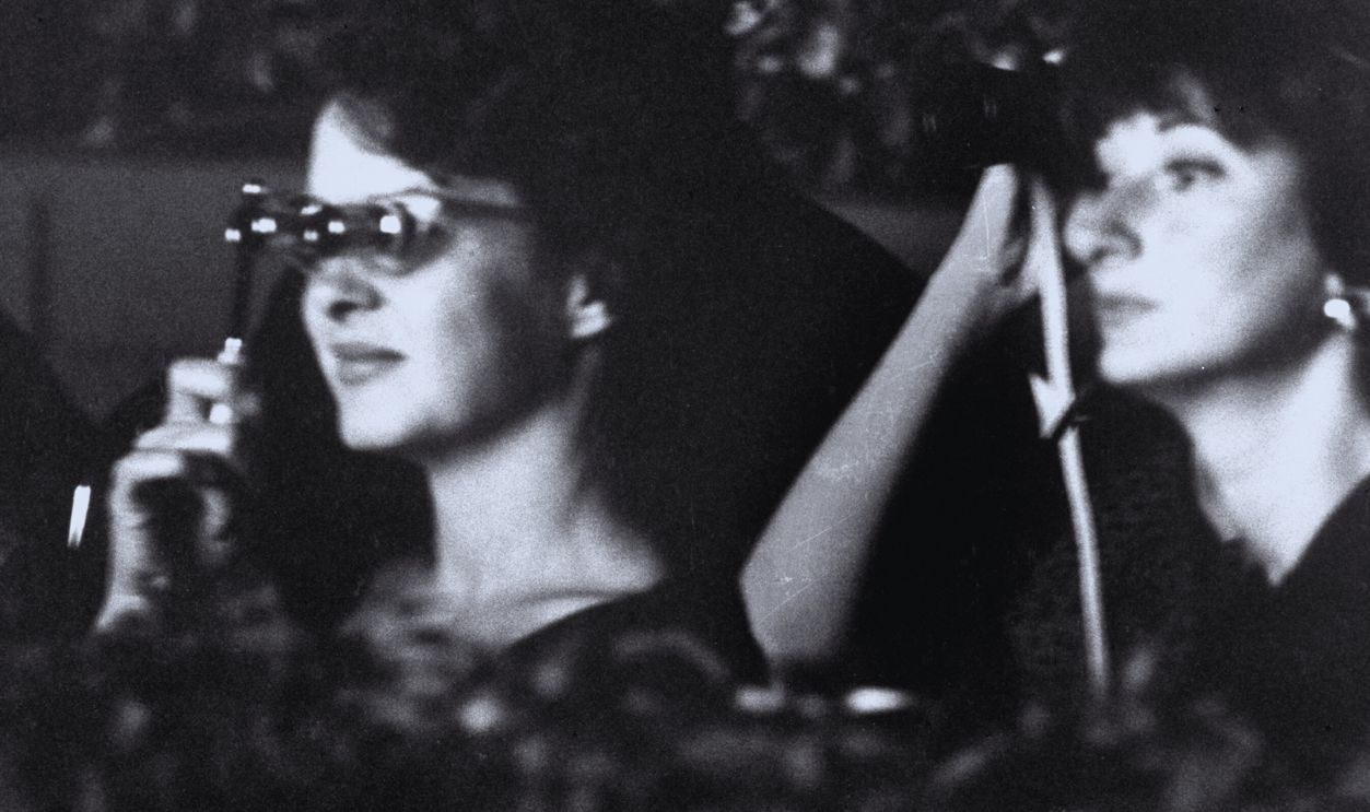 Gettyimages - 	50547103, Mrs. Hughes At A Concert American former actress Jean Peters (1926 - 2000) (L) third wife of businessman and producer Howard Hughes with Austrian-born actress Vanessa Brown at a Hollywood Bowl concert, 1962. 