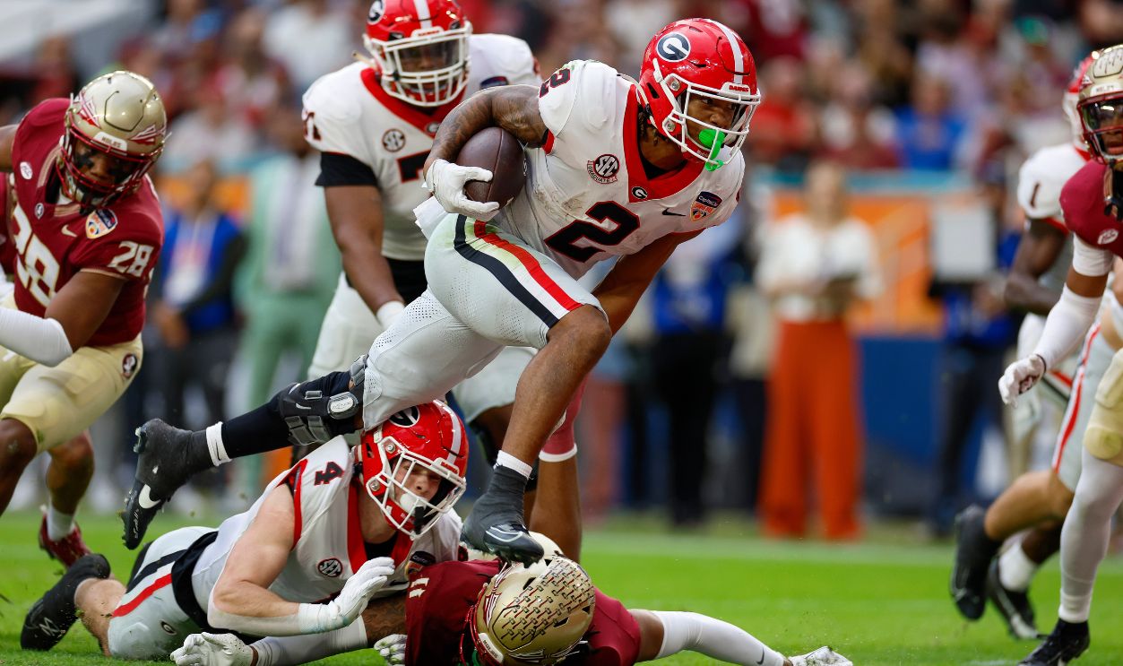 Gettyimages - 1888259147, Capital One Orange Bowl - Georgia v Florida State MIAMI GARDENS, FLORIDA - DECEMBER 30: Kendall Milton #2 of the Georgia Bulldogs runs for a touchdown in the first half against the Florida State Seminoles during the Capital One Orange Bowl at Hard Rock Stadium on December 30, 2023 in Miami Gardens, Florida. 