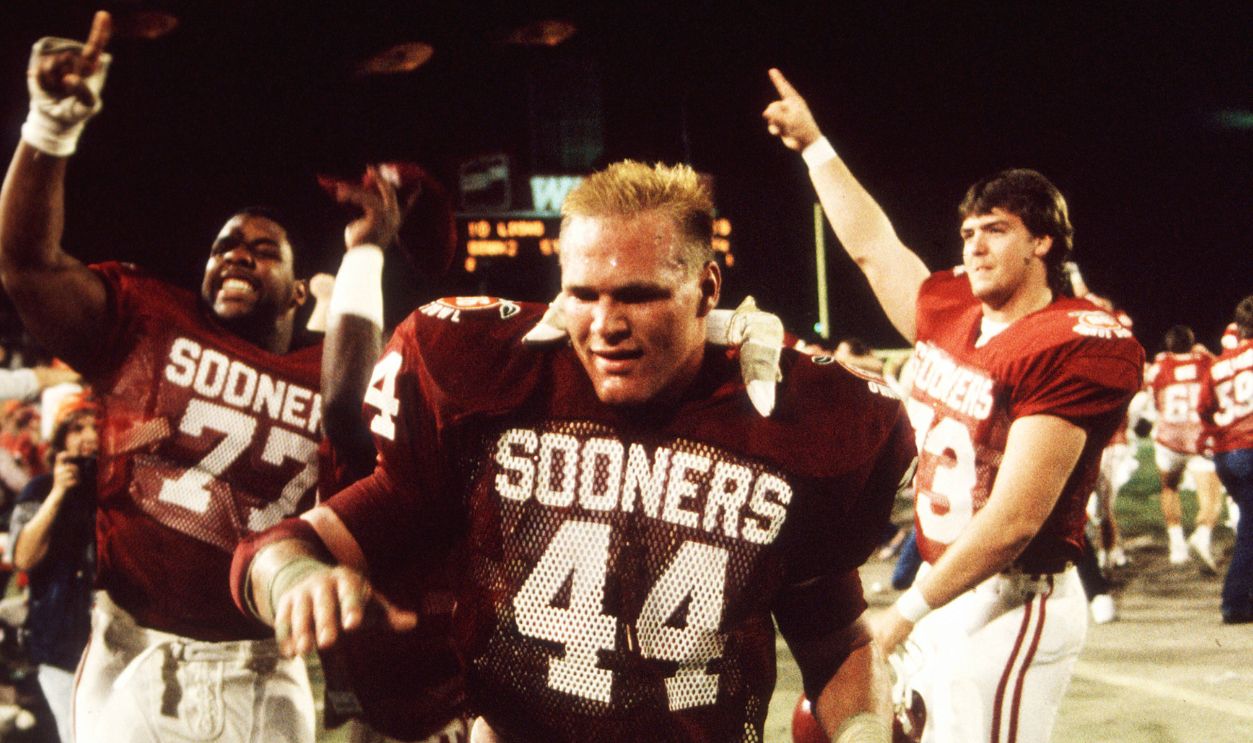 Gettyimages - 628598336, NCAA Football Archive 1 Jan 1986: Linebacker Brian Bosworth of the Oklahoma Sooners celebrates with teammates after the Sooners 25-10 Orange Bowl victory over the Penn State Nittany Lions at the Orange Bowl in Miami, FL. The victory gave the Sooners the National Championship, Barry Switzer's third and the school's sixth. 