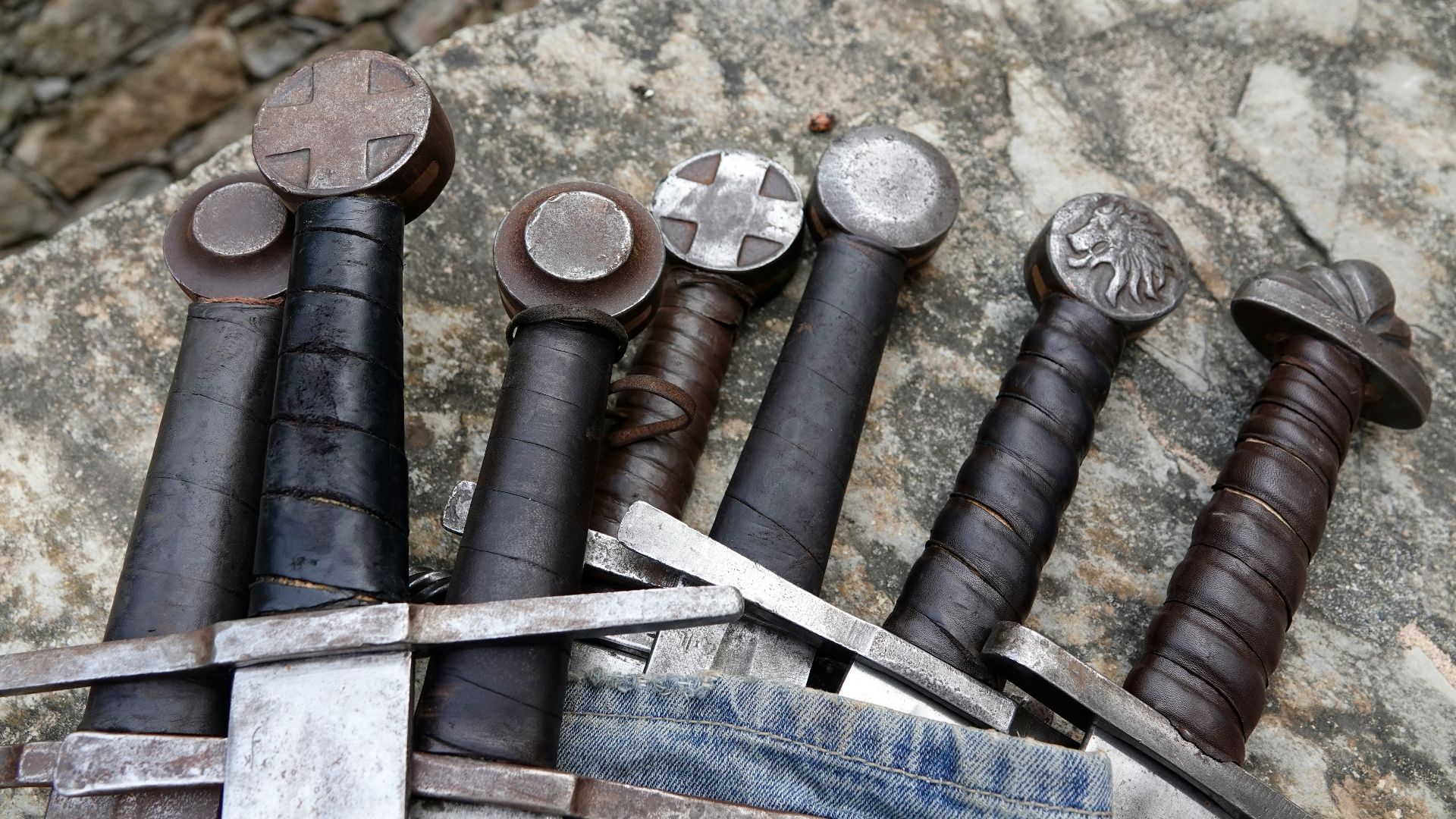 a bunch of different types of tools on a rock