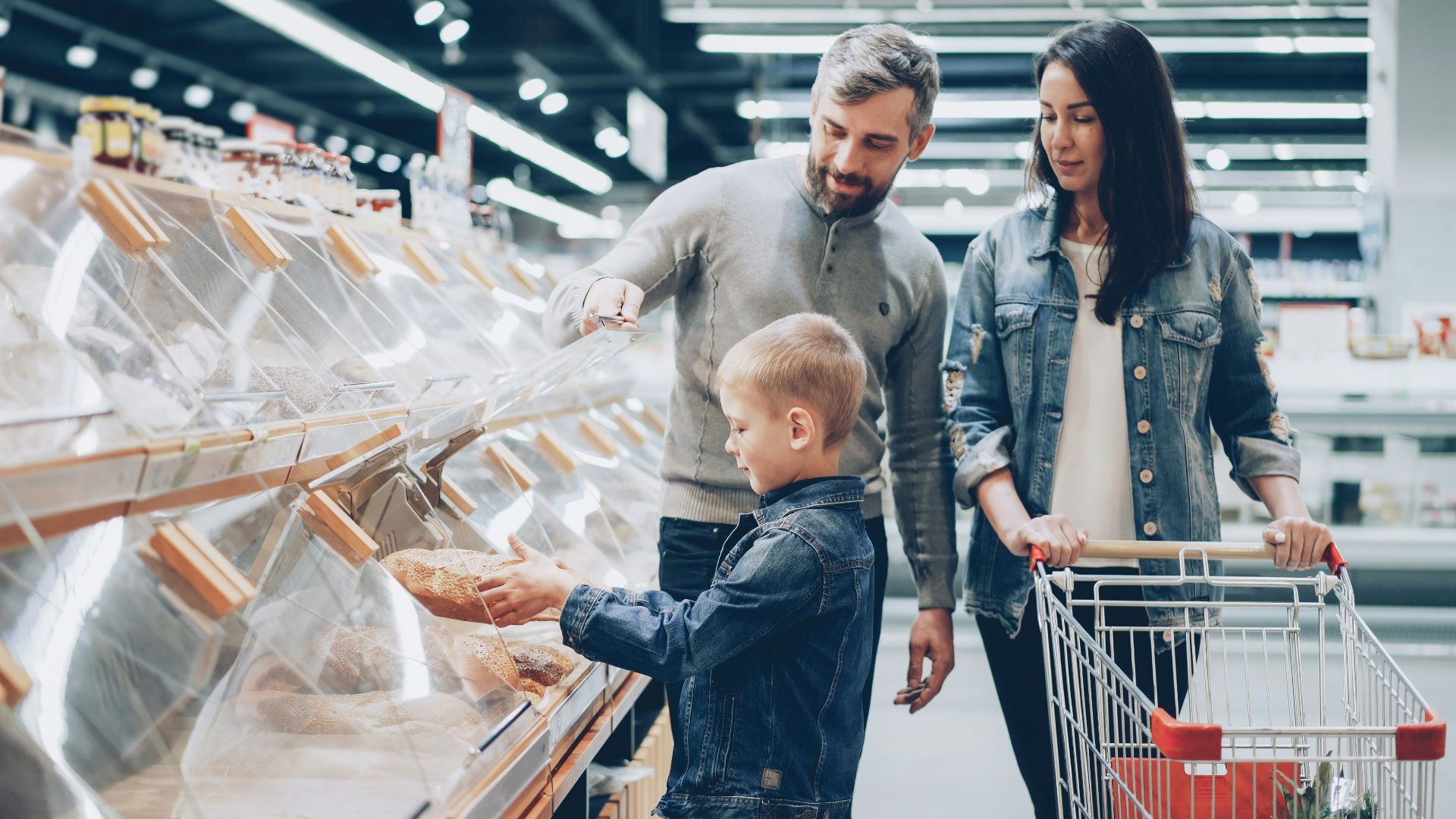Family is shopping at a grocery store.
