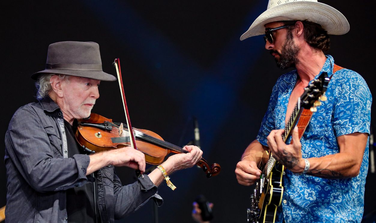 Gettyimages - 1252479496, Ryan Bingham performs on the Palomino Stage at the three-day Stagecoach Country Music Festival Indio, CA - April 30: Richard Bowden, left, plays fiddle with Ryan Bingham as they perform on the Palomino Stage at the three-day Stagecoach Country Music Festival at the Empire Polo Club in Indio Sunday, April 30, 2023. Stagecoach is billed as the largest country music festival in the world. 