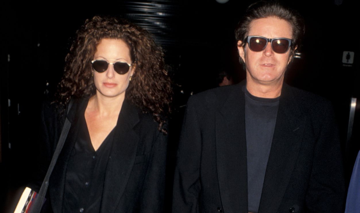 Gettyimages - 152899106, Don Henley and Sharon Summerall Sighted at Los Angeles International Airport LOS ANGELES - APRIL 19: Musician Don Henley of The Eagles and Sharon Summerall being photographed on April 19, 1993 at Los Angeles International Airport in Los Angeles, California.