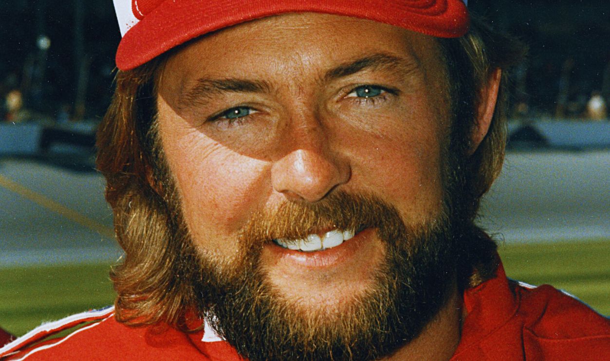 Gettyimages - 141972551, Tim Richmond - NASCAR Early 1980s DAYTONA BEACH, FL — Early 1980s: Tim Richmond at Daytona International Speedway during the time he drove the Old Milwaukee Pontiac on the NASCAR Cup circuit for car owner Raymond Beadle. From 1983 through 1985, Richmond ran 88 Cup races in Beadle’s car, scoring a pair of wins and 39 top 10 finishes.