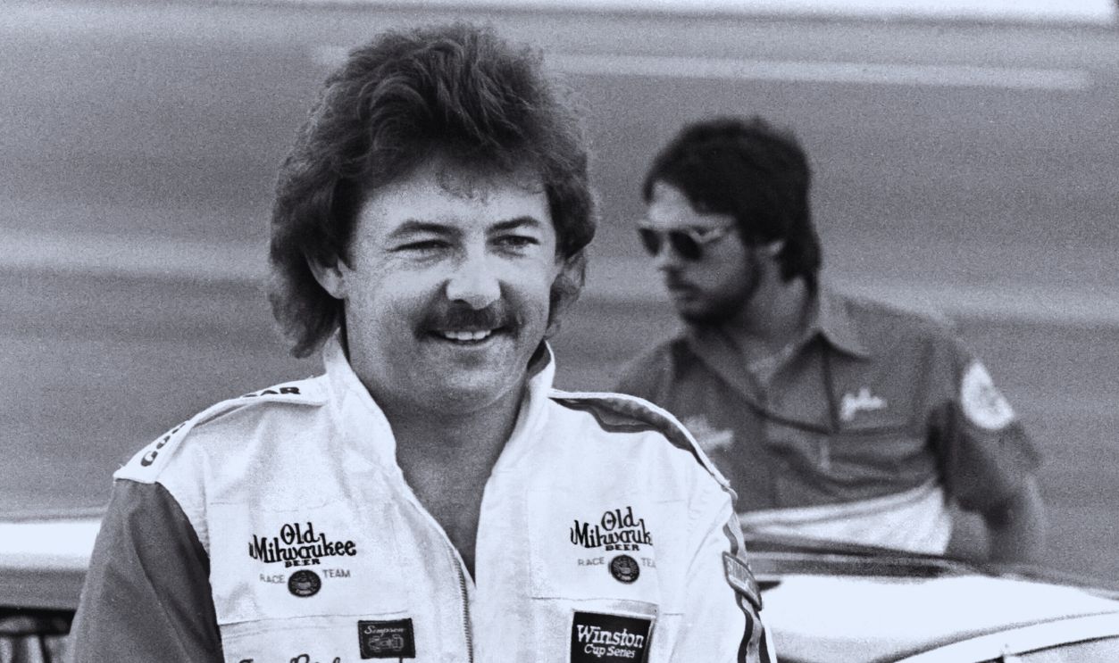 Gettyimages - 136253455, 1983 Firecracker 400 DAYTONA BEACH, FL - JULY 3, 1983: NASCAR driver Tim Richmond poses for photographers after qualifying for the 1983 Firecracker 400 on July 3, 1983 at the Daytona International Speedway in Daytona Beach, Florida. 