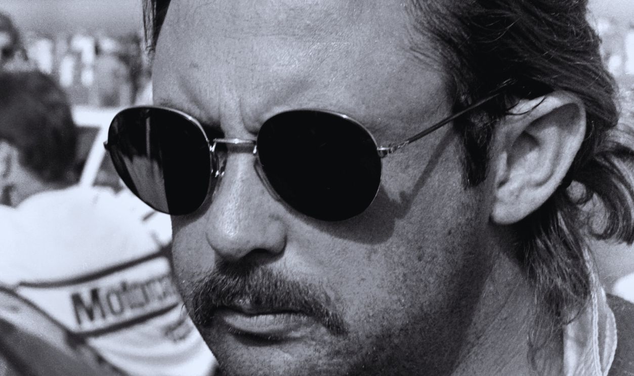 Gettyimages - 136253343, 1987 Firecracker 400 DAYTONA BEACH, FL - JULY 4, 1987: NASCAR driver Tim Richmond stands beside his race car prior to the start of the 1987 Firecracker 400 on July 4, 1987 at the Daytona International Speedway in Daytona Beach, Florida. 