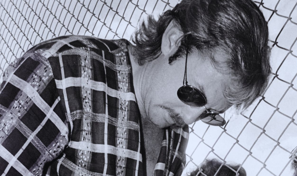 Gettyimages - 1288878825, NASCAR driver Tim Richmond DAYTONA BEACH, FLORIDA - JULY 1987: NASCAR driver Tim Richmond signs autographs for young fans prior to the start of the 1987 Pepsi Firecracker 400 stock car race at Daytona International Speedway in Daytona Beach, Florida. 