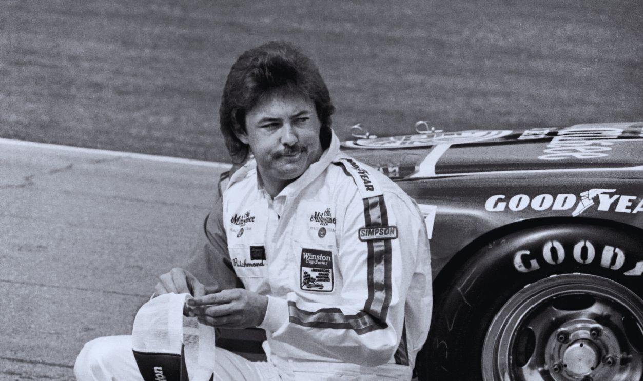 Gettyimages - 136253377, 1983 Firecracker 400 DAYTONA BEACH, FL - JULY 3, 1983: NASCAR driver Tim Richmond poses for photographers after qualifying for the 1983 Firecracker 400 on July 3, 1983 at the Daytona International Speedway in Daytona Beach, Florida. 