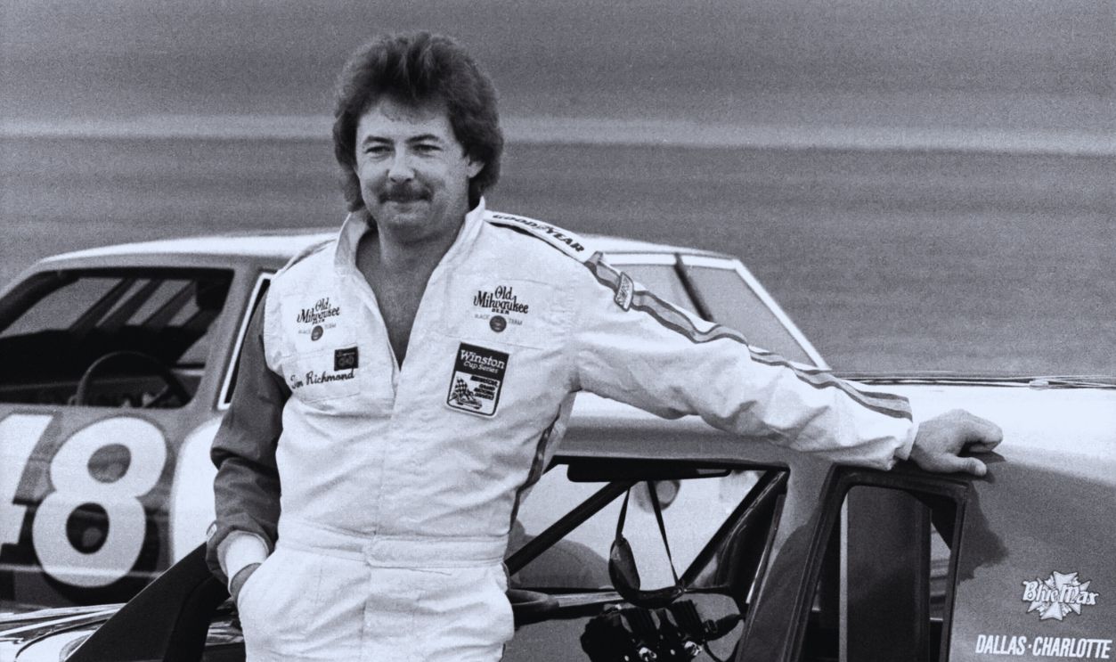 Gettyimages - 136253431, 1983 Firecracker 400 DAYTONA BEACH, FL - JULY 3, 1983: NASCAR driver Tim Richmond poses for photographers after qualifying for the 1983 Firecracker 400 on July 3, 1983 at the Daytona International Speedway in Daytona Beach, Florida. 