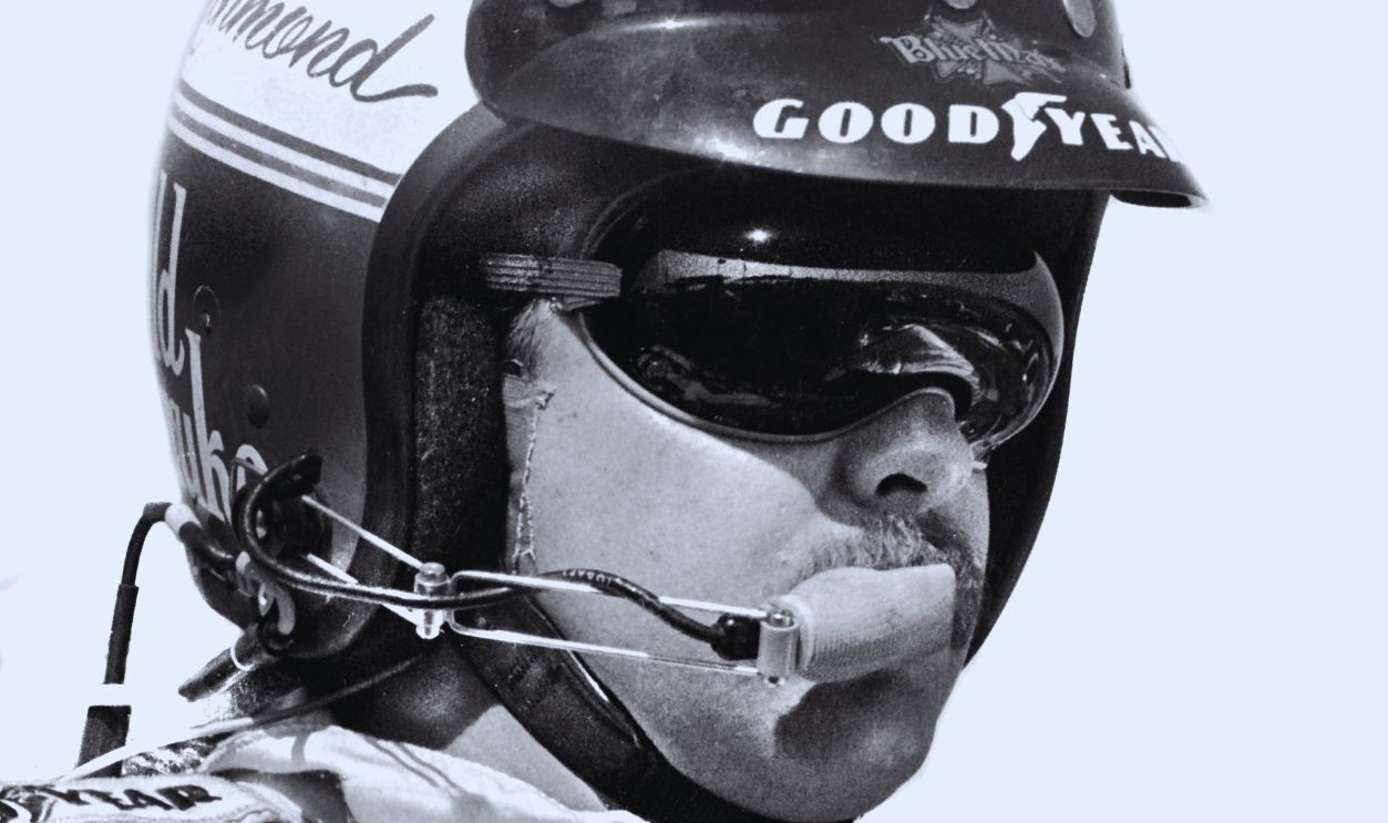 Gettyimages - 	1313351530, NASCAR driver Tim Richmond DAYTONA BEACH, FLORIDA - FEBRUARY 1985: NASCAR driver Tim Richmond prepares to compete in the 1985 Daytona 500 stock car race at Daytona International Speedway in Daytona Beach, Florida.  