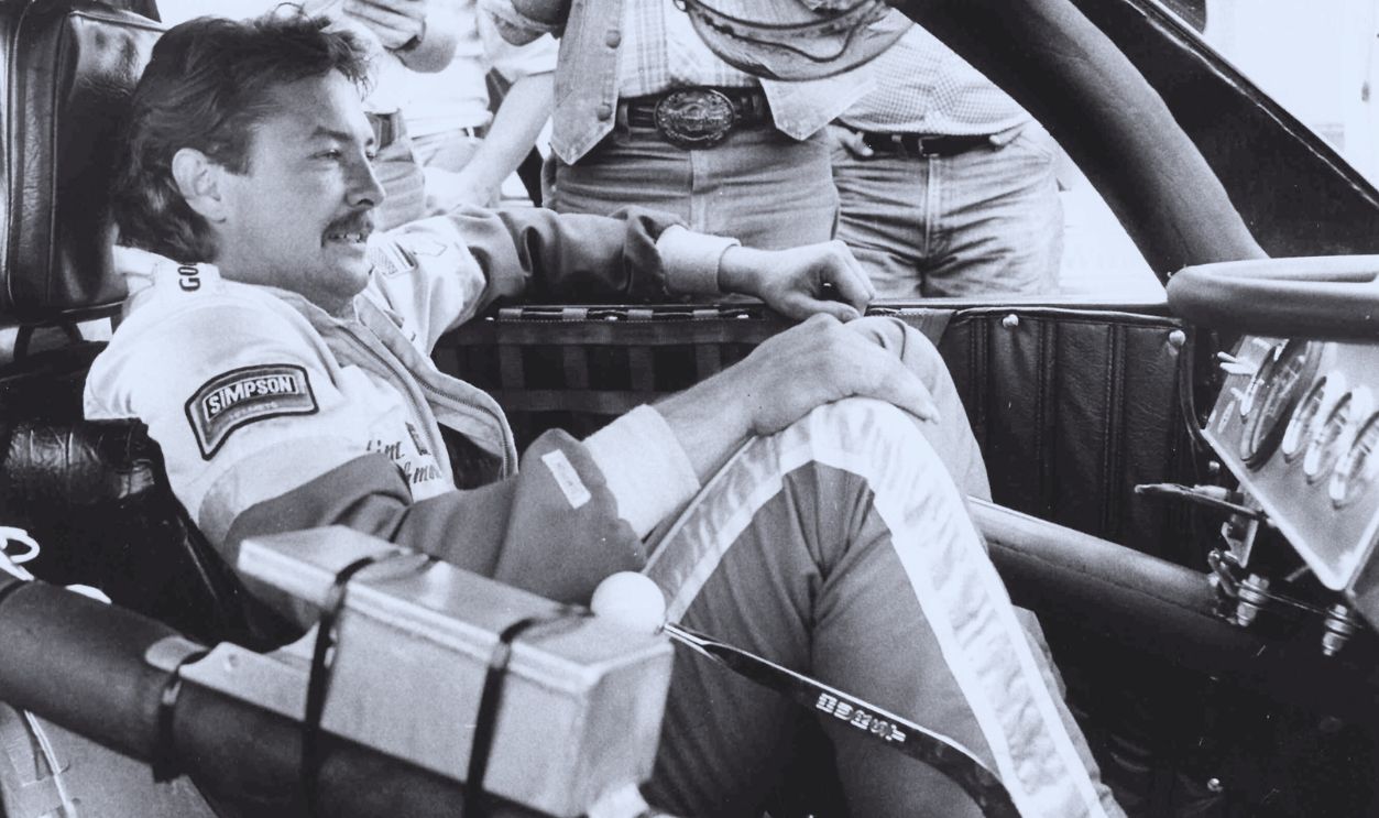 Gettyimages - 103419343, Tim Richmond UNKNOWN: Tim Richmond waiting out pre-race ceremonies in his car before a NASCAR Cup race. The steering wheel is removed for easier boarding into the cars.