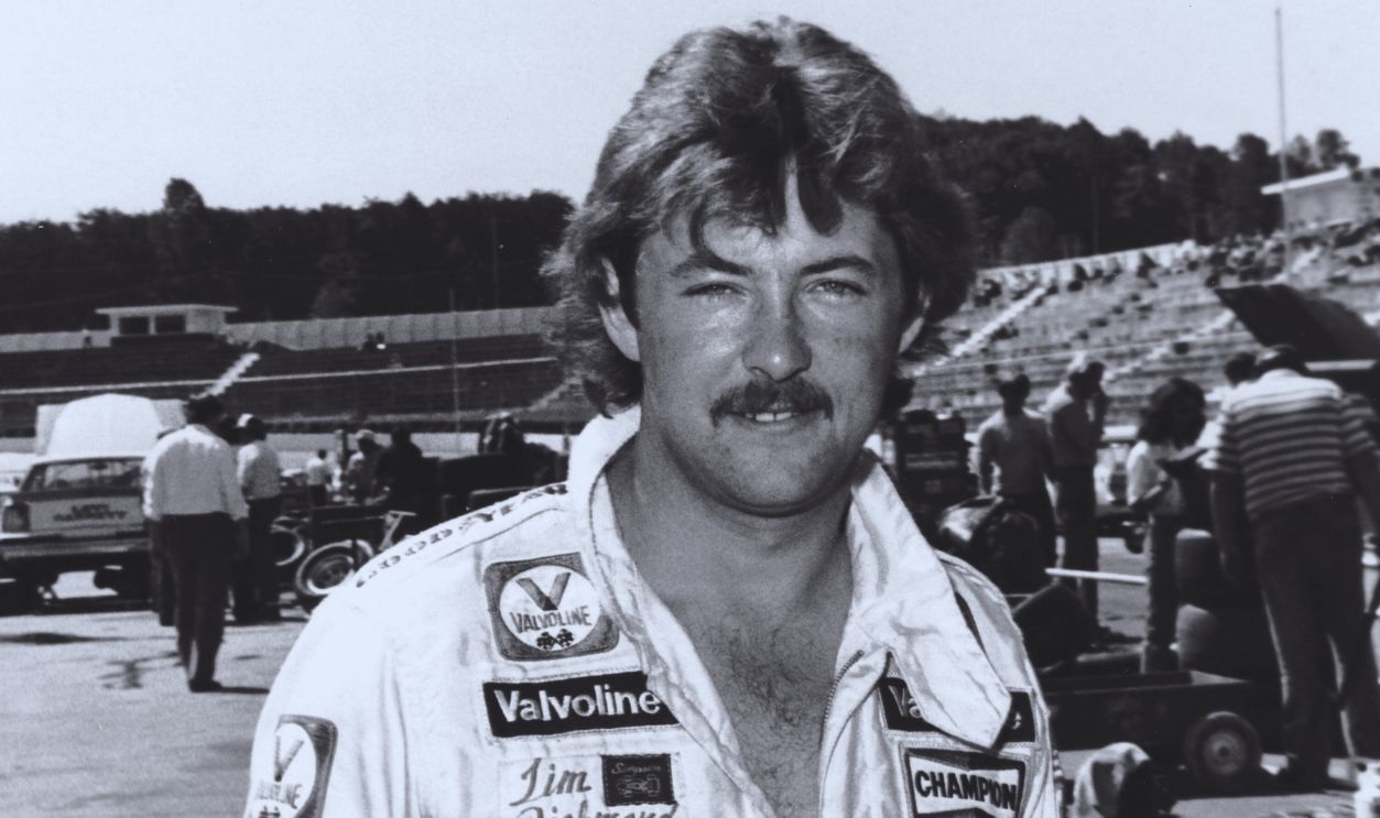 Gettyimages - 105204446, Tim Richmond MARTINSVILLE, VA - 1982: Tim Richmond poses at Martinsville Speedway during the 1982 NASCAR Cup season. Driving for Jim Stacy, Richmond won the first two Cup races of his career, sweeping both events at Riverside International Raceway in Riverside, California.